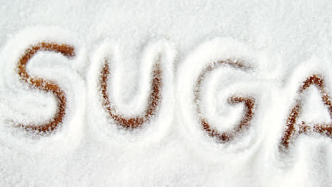 sugar written on sugar powder