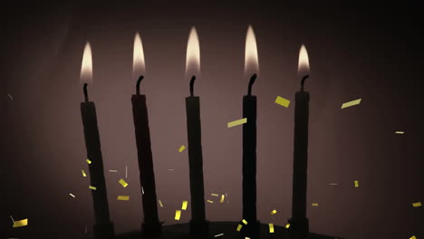 confeti dorado cayendo sobre la silueta de varias velas encendidas contra un fondo gris