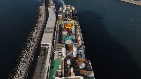 aerial-shot-over-cruise-ship-docked-in-the-port-of-Funchal-on-the-island-of-Madeira-on-a-sunny-day