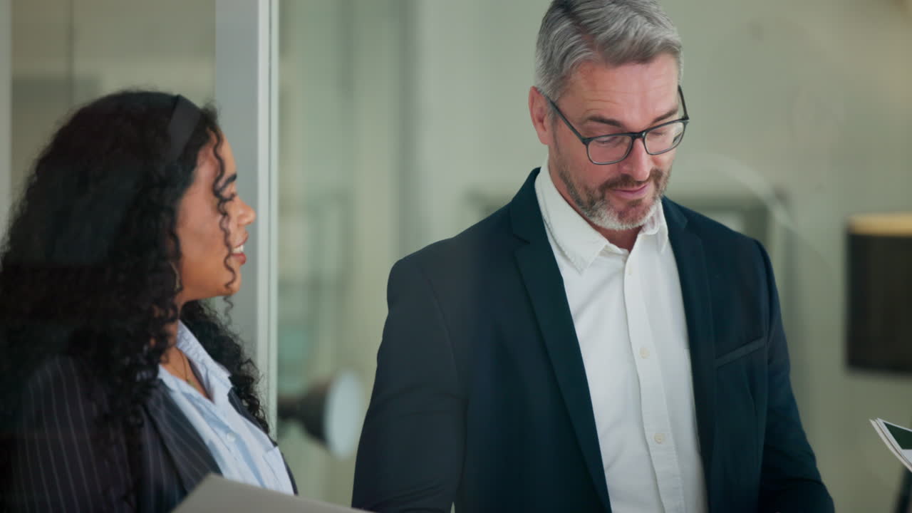 Professional Man and Woman Having a Business Discussion