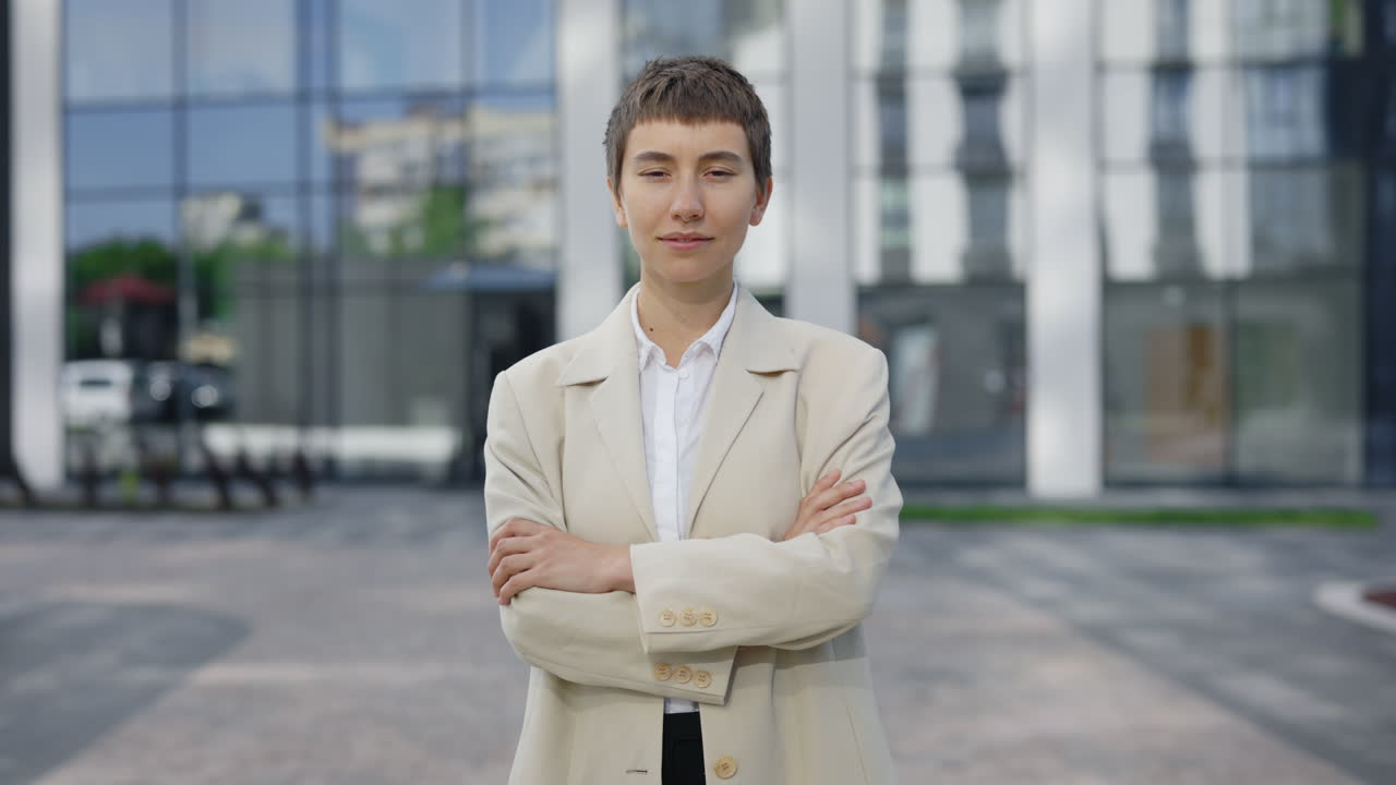 Confident Businesswoman in Front of Modern Office Building