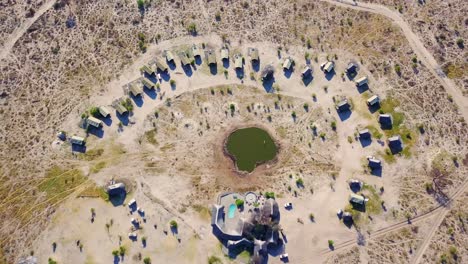 nice aerial over a safari lodge around a watering hole at chobe national park botswana africa 1