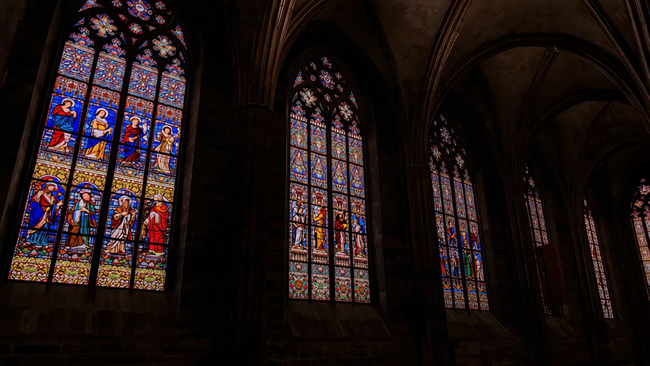 Filtering daylight through 3 stained glass window panels at cathedral casting shadows on columns