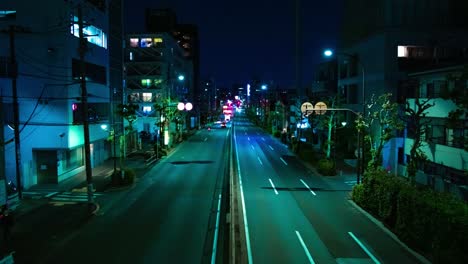 a night timelapse of the traffic jam at the downtown street in tokyo wide shot