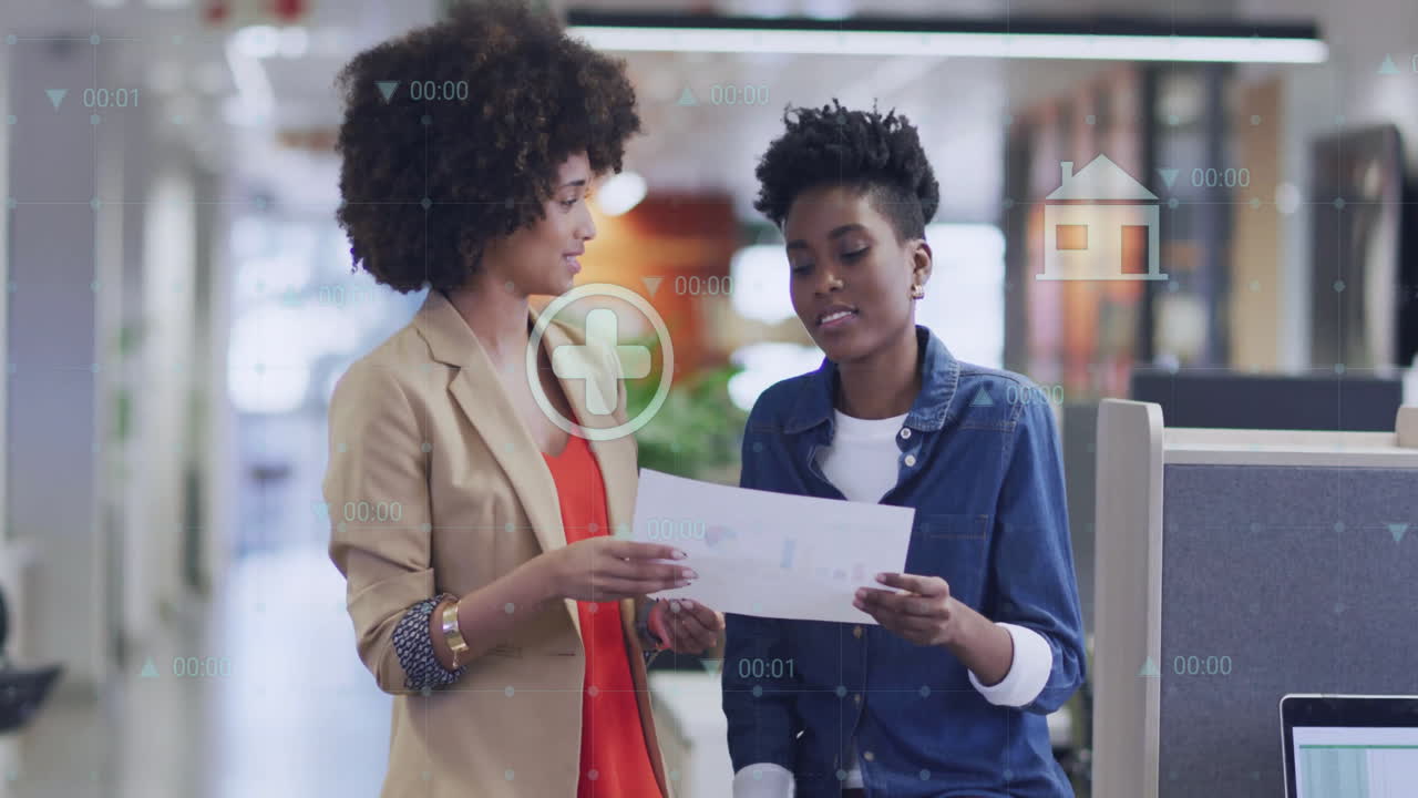 Animation of diagram and data processing over biracial female colleagues talking in office