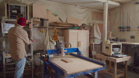 woodworker using cnc machine