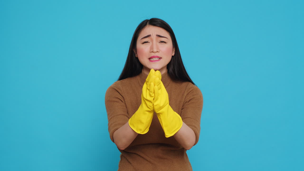 Housewife parying in front of camera