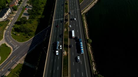 qew burlington hamilton overlooking jimmy lomax park beach blvd curvy overpass underpass eastport drive sunny summer day with tankers at hamilton harbour parallax angled overpass stunning view2-2