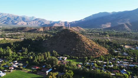 Cerro-and-mountains-of-Pirque,-with-the-Andes-mountain-range-in-the-background,-country-of-Chile