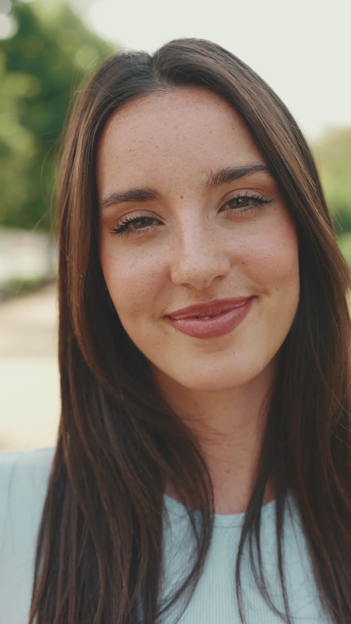 Portrait of a Smiling Brunette Woman