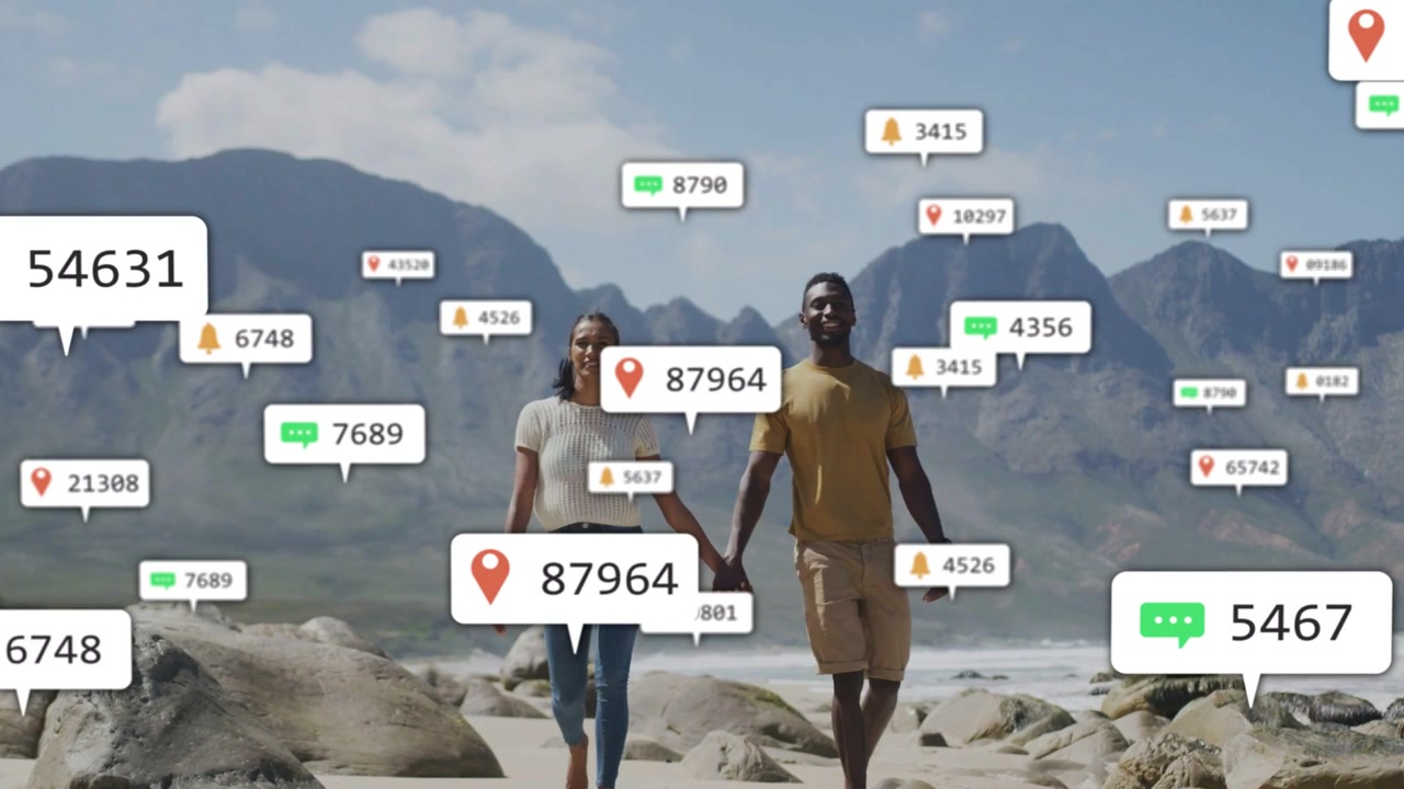 Pair walking holding hands on beach, pin appearing then spawning alerts around them for social buzz