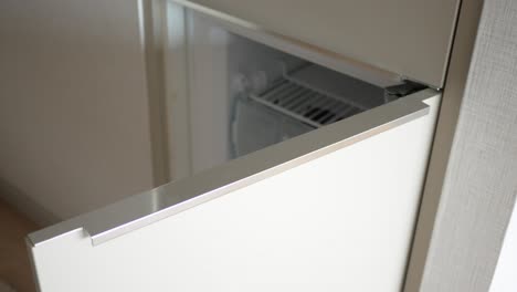 modern refrigerator with silver handle