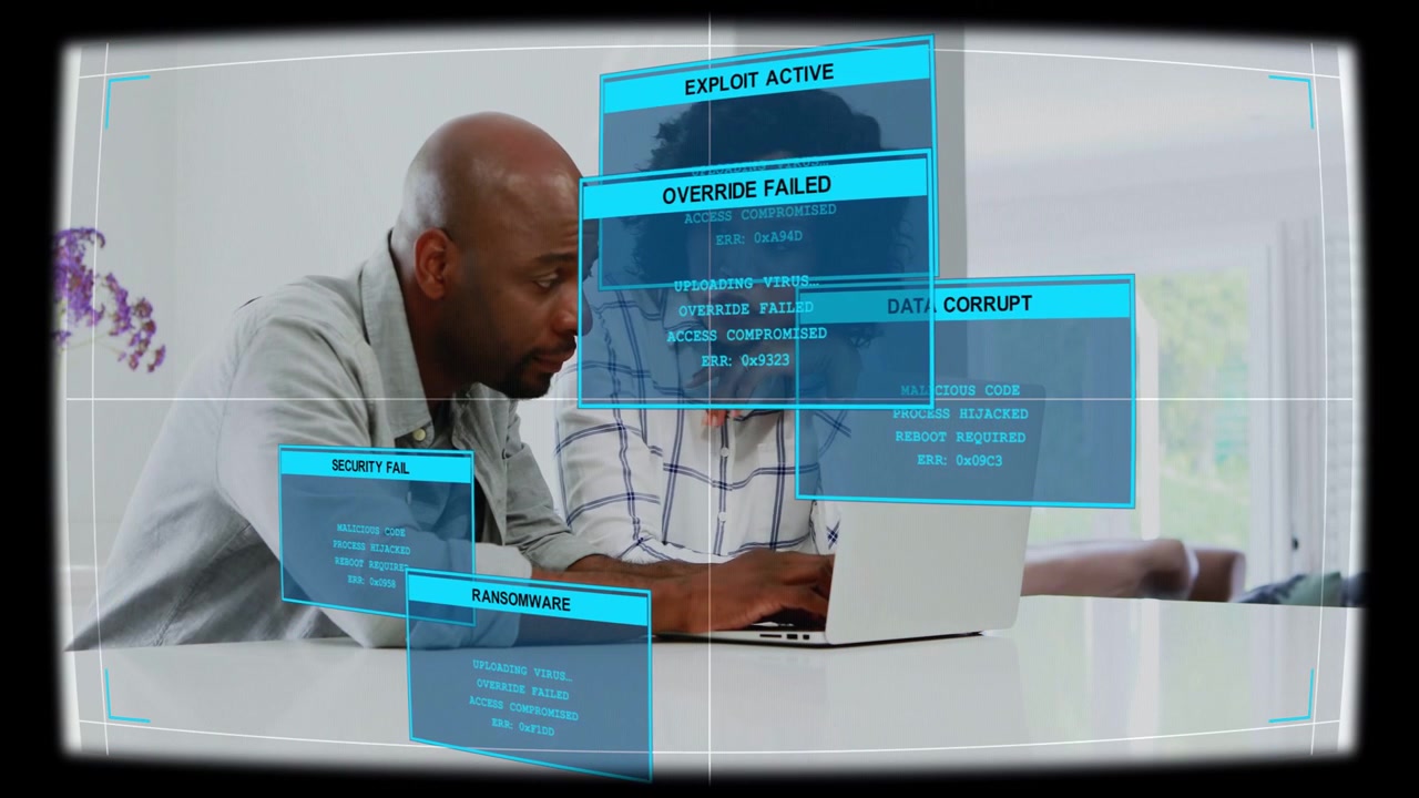 Couple leaning at laptop as HUD alerts appearing woman typing man watching stopping security breach