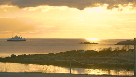 Stunning-cinematic-shot-of-the-Hurtigruten-off-the-Lofoten-Islands,-Norway