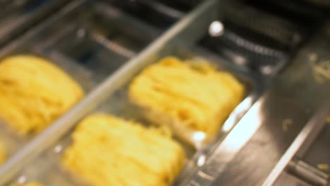 many types of high quality pasta been produced at a large modern pasta factory