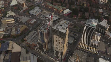 Aerial view from up above of a condominium apartment complex under construction