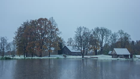 Cozy-lake-side-home-in-all-four-seasons,-time-lapse-view