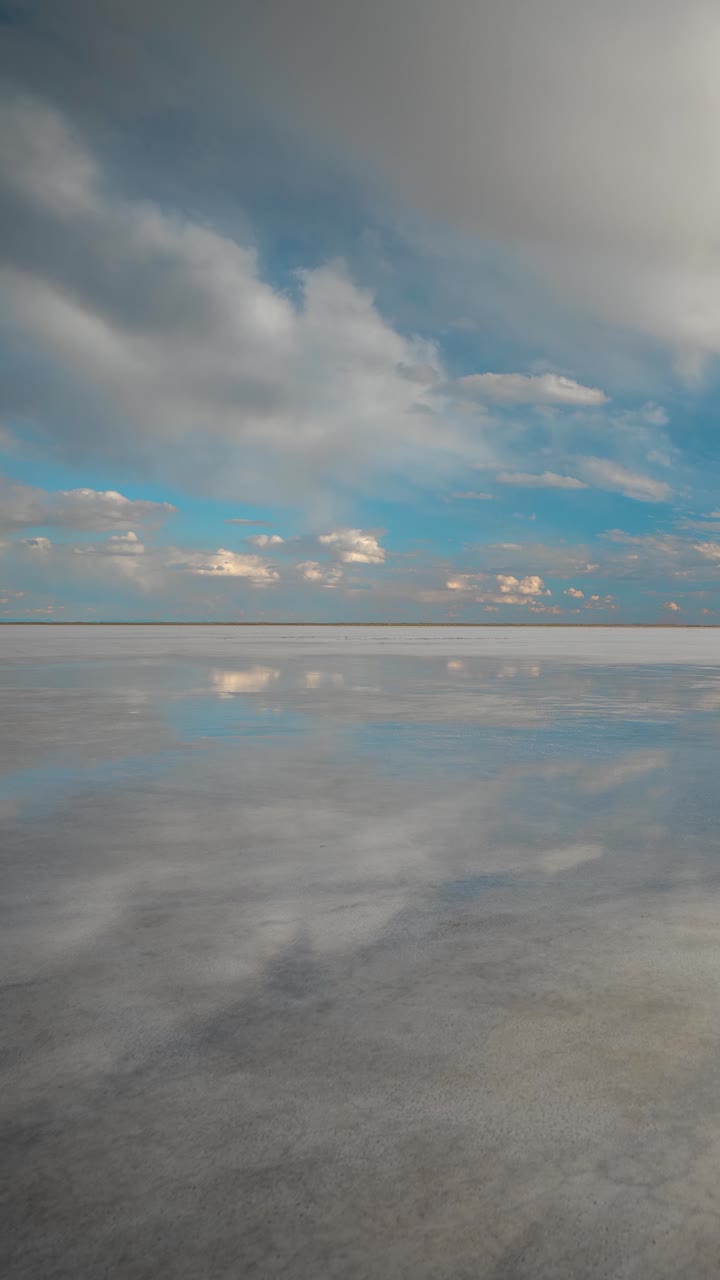 Reflection of Sky and Clouds on a Salt Flat