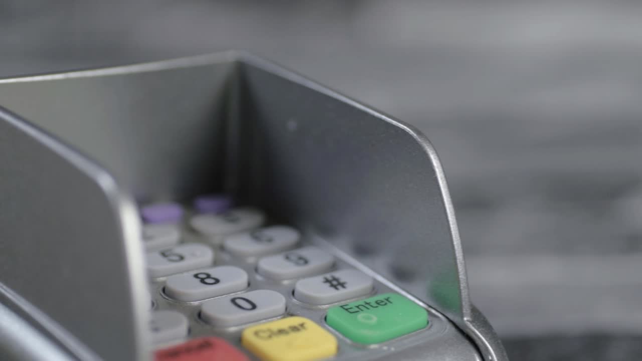 Pdq payment machine panning close up panning shot