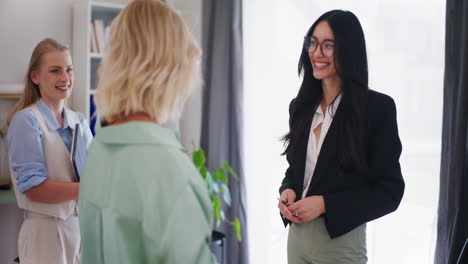 businesswoman welcomes new company employees