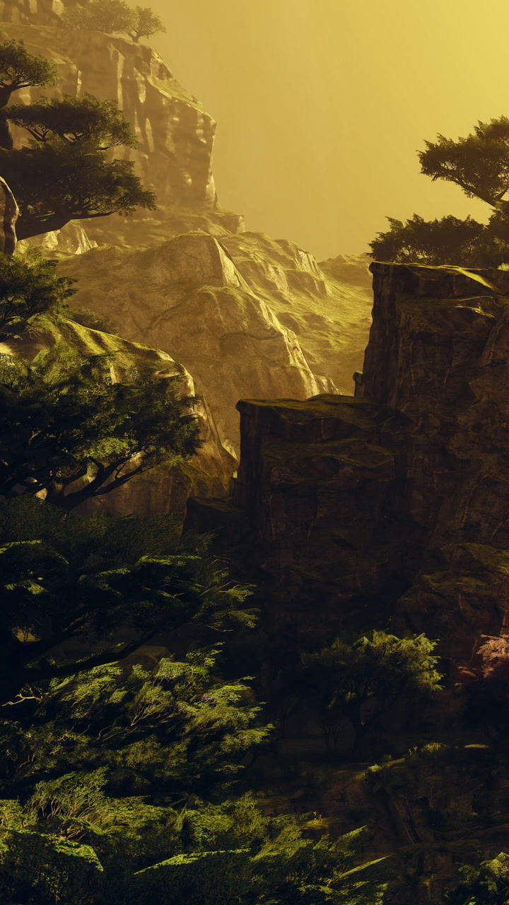 Majestic cliffs tower over lush greenery bathed in golden light during sunset