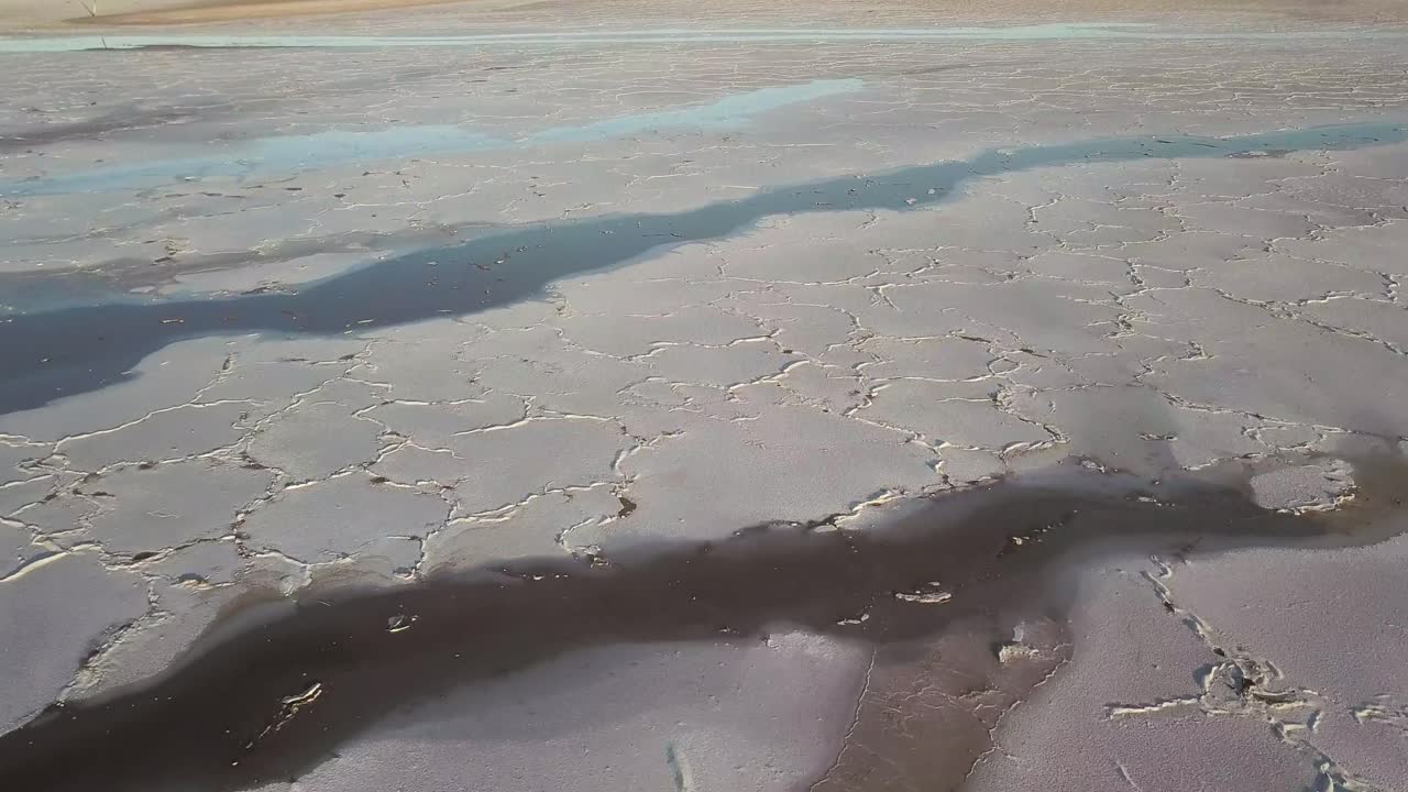 Lake Tyrrell Australia, drone flying over the white salt lake and shallow waters