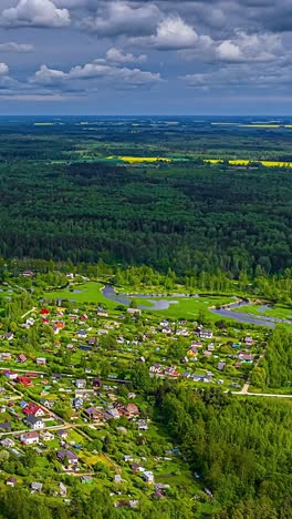rural village landscape nature forest alpine resort countryside aerial vertical timelapse