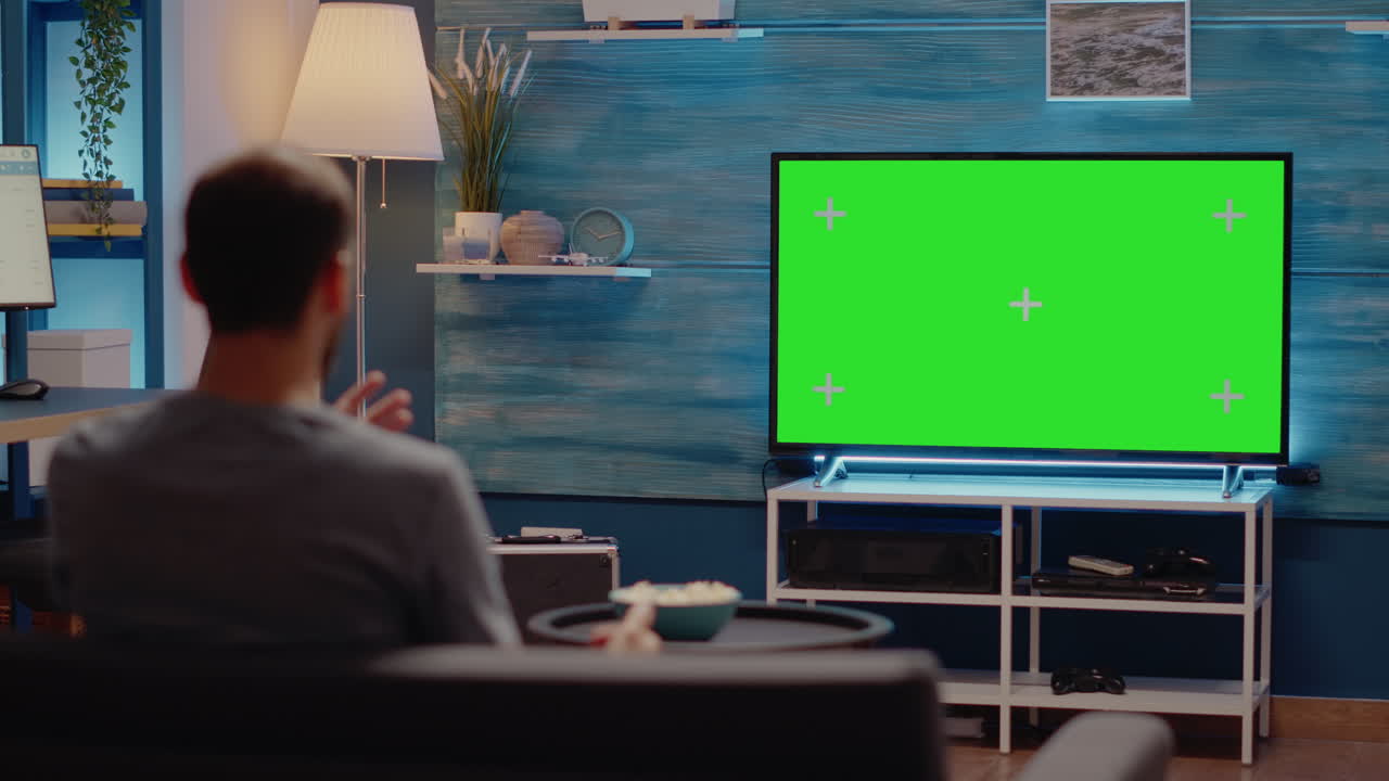 Person watching sport event or football on green screen