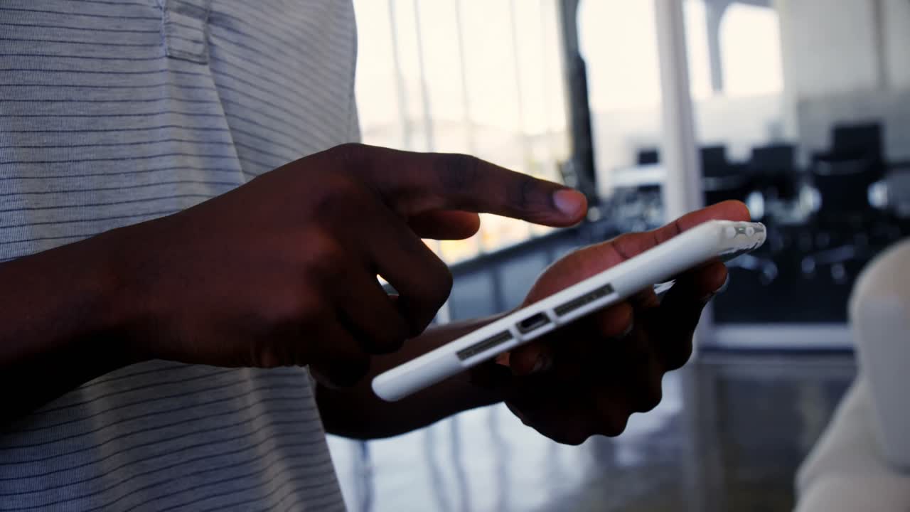 Executive digital tablet in office