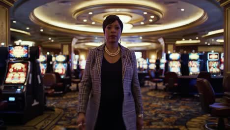 a confident presence: a woman strolling through an elegantly designed casino, surrounded by glimmering slot machines and an air of anticipation