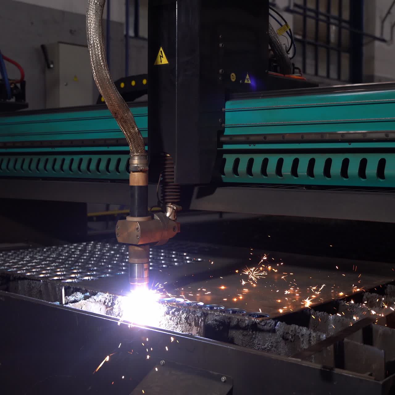 Laser cutter cuts metal parts. Industrial machine CNC. Plasma laser processing manufacture technology. Automatic work for ironwork.