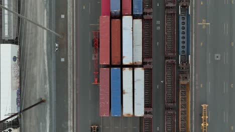 overhead aerial view lowering over loaded train carts in the port of seattle