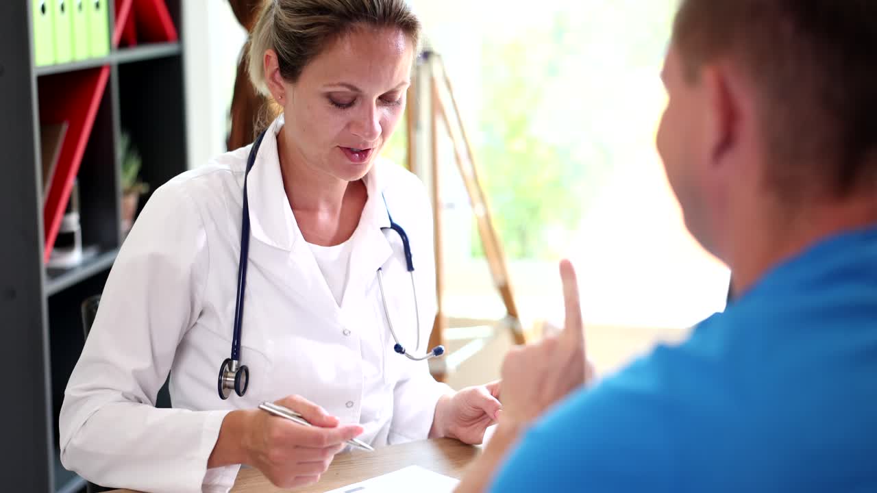 Doctor consulting with patient in clinic
