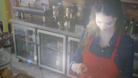 Animation-of-light-circles-and-white-dots-floating-over-Caucasian-female-waitress