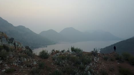 majestic view of badi lake on a foggy morning in udaipur, rajasthan, india. - aerial drone backward