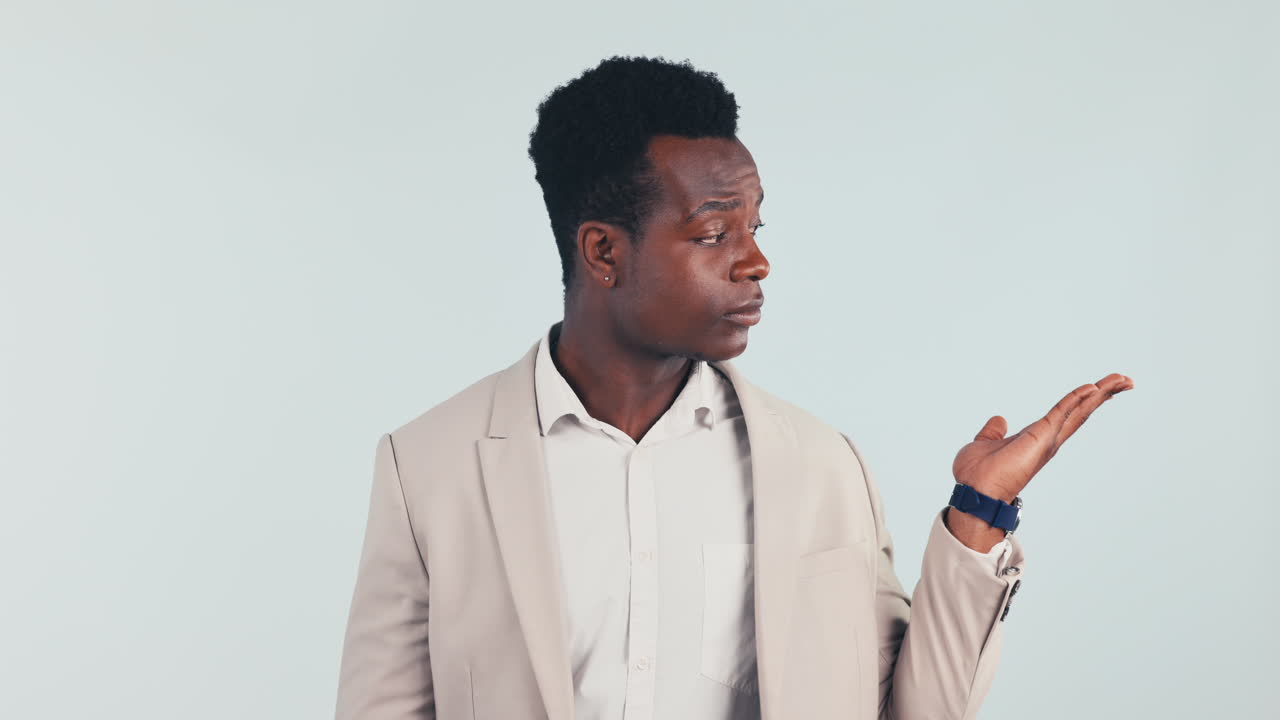 Hands, choice and confused man in studio with why