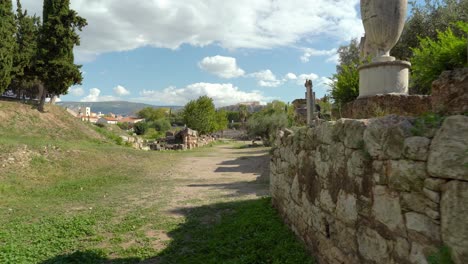 numerous sculptures erected along the sacred way - a road from athens to eleusis