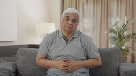 Sick-Indian-old-man-suffering-from-stomach-pain