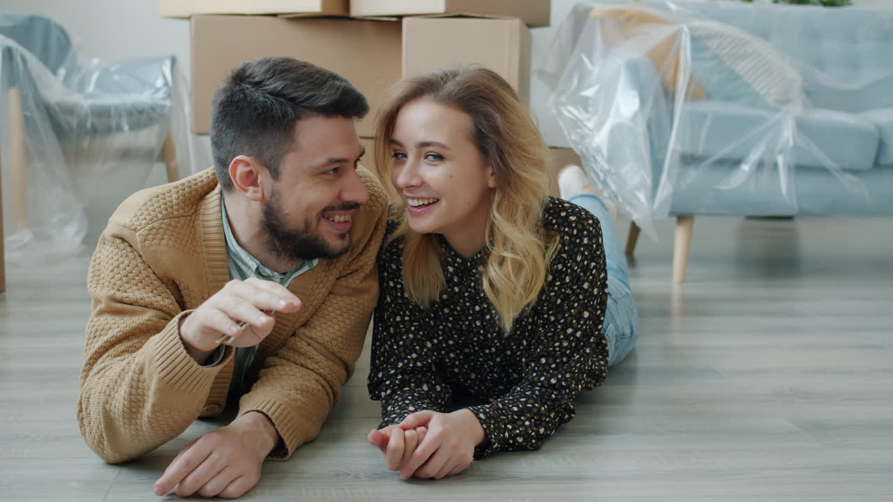 Happy Couple Moving Into a New House