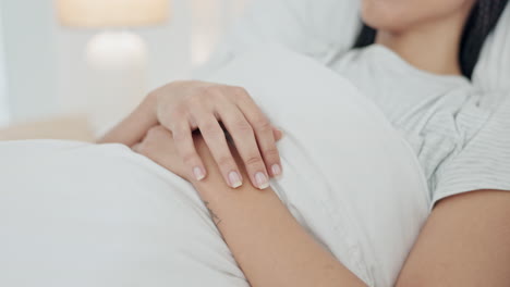 Anxiety,-stress-and-hands-of-woman-in-bed