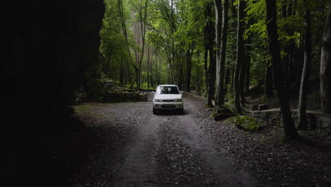 Car-Driving-Offroad-Through-Forested-Valley-In-Chitakhevi,-Georgia