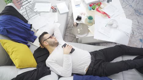 Lazy man in untidy and dirty house.