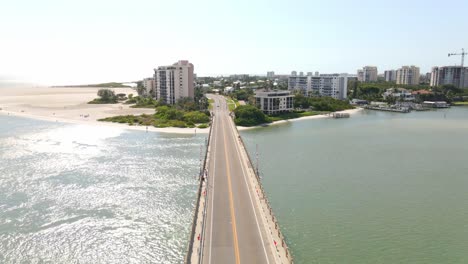 South-side-of-Fort-Myers-island,-waterfront-mansions,-apartment-buildings-and-hotel