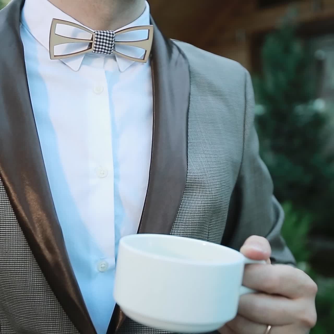 Man With Tea Cup Outdoors