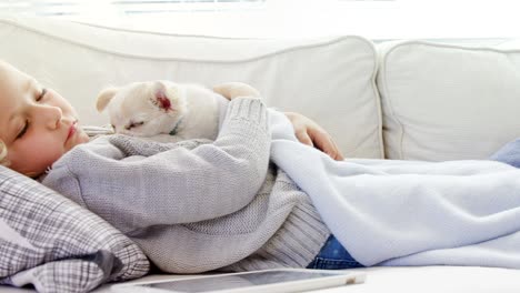 little girl sleeping on sofa holding her pet in her arms 4k 4k