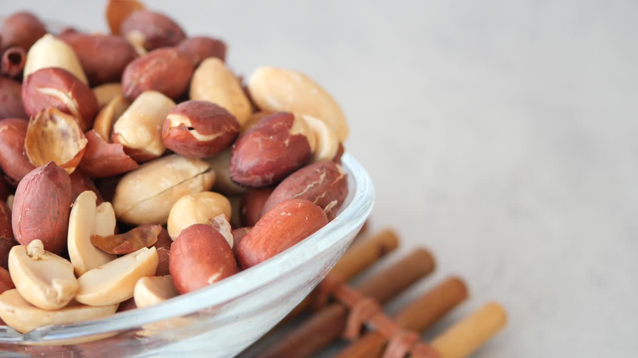Roasted Peanuts in Glass Bowl