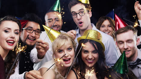 mixed race group of friends celebrating independence day slow motion party photo booth