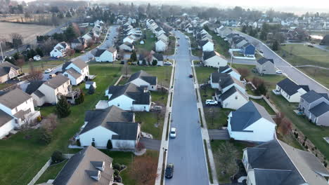 rising aerial of residential housing development in usa