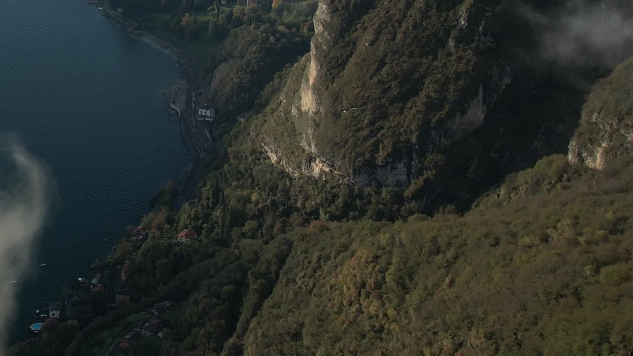 Stunning aerial view of the Italian Alps near a tranquil lake