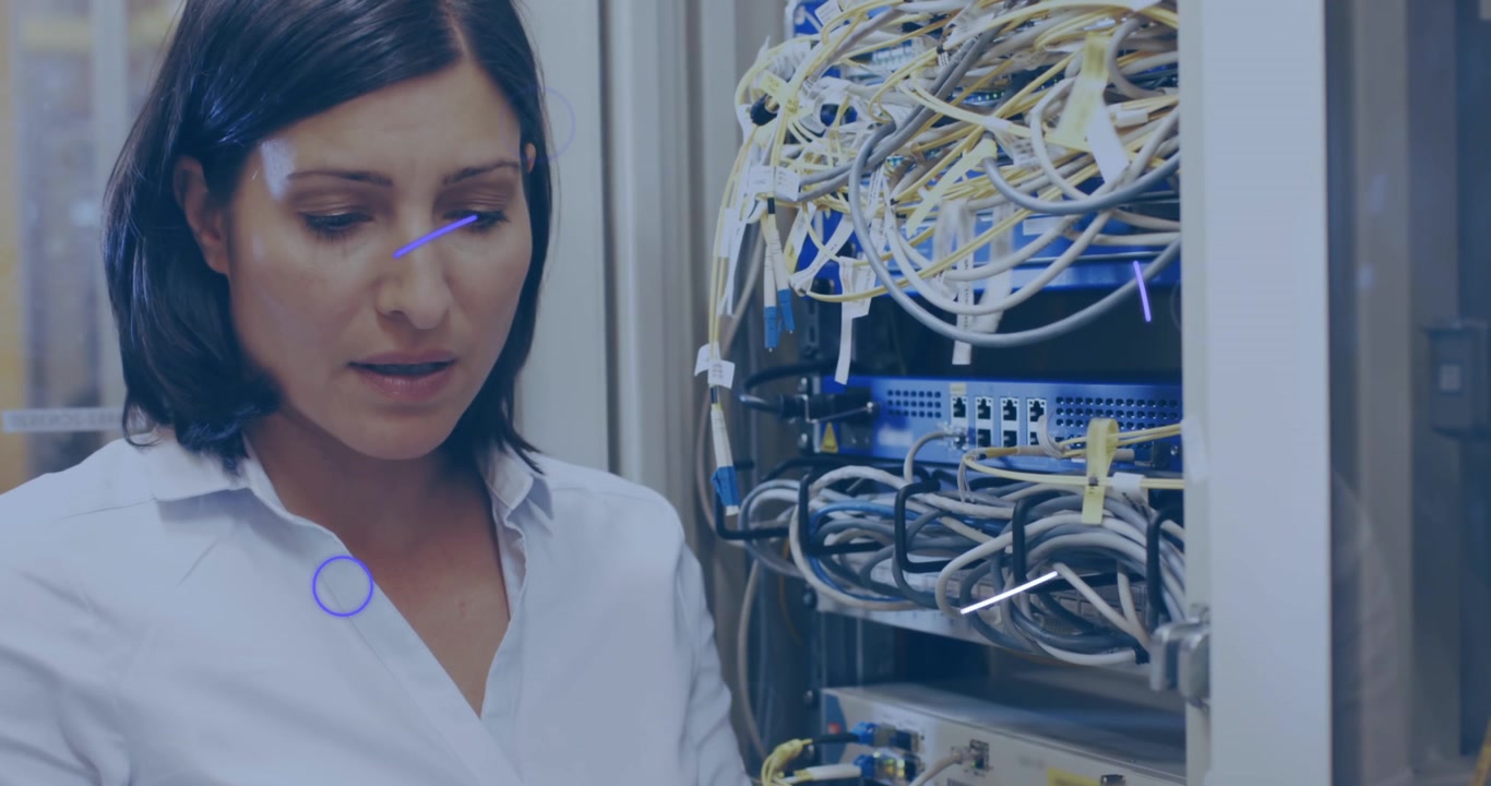 Animation of eye over caucasian woman checking servers